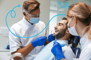 intiveo dentists working on male patient